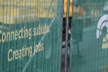 Indigi mesh banner signage for the Suburban Rail Loop East project